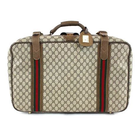 gucci suitcases sale